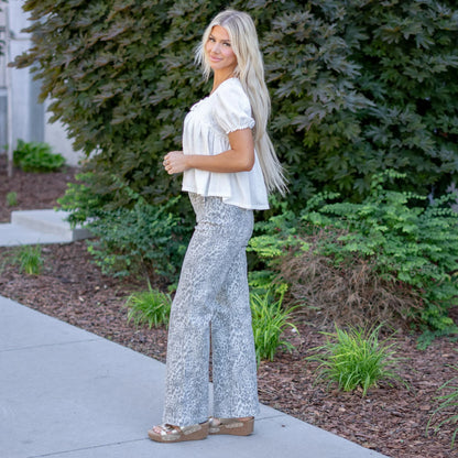 KanCan High Rise Wide Flare Jeans with Leopard Print